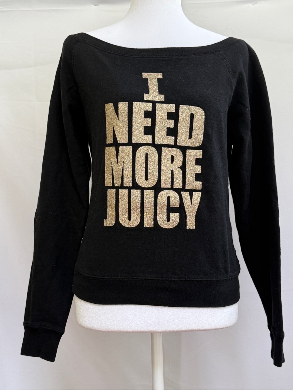 Juicy Couture Black Off-Shoulder Sweater with Gold Glitter Text